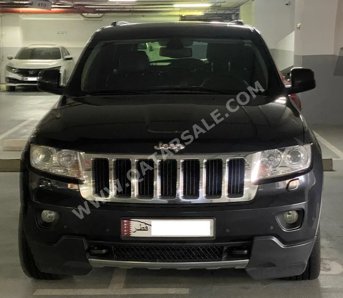 Jeep  Grand Cherokee  Limited  2013  Automatic  153,000 Km  8 Cylinder  Four Wheel Drive (4WD)  SUV  Dark Blue