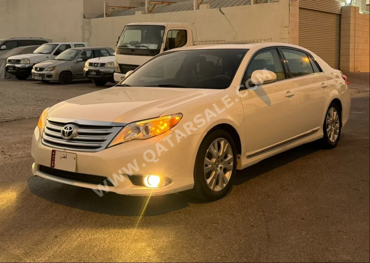 Toyota  Avalon  2012  Automatic  96,000 Km  6 Cylinder  Front Wheel Drive (FWD)  Sedan  White