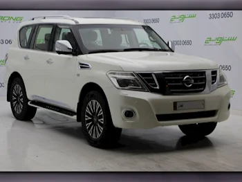 Nissan  Patrol  Platinum  2014  Automatic  200,600 Km  8 Cylinder  Four Wheel Drive (4WD)  SUV  Pearl