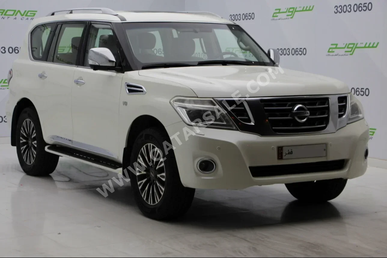 Nissan  Patrol  Platinum  2014  Automatic  200,600 Km  8 Cylinder  Four Wheel Drive (4WD)  SUV  Pearl