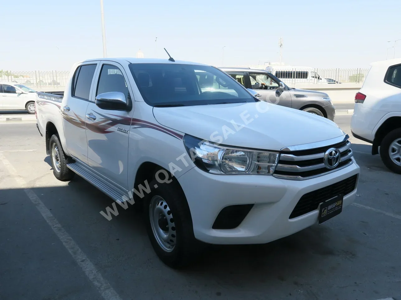 Toyota  Hilux  2022  Automatic  45,000 Km  4 Cylinder  Four Wheel Drive (4WD)  Pick Up  White  With Warranty