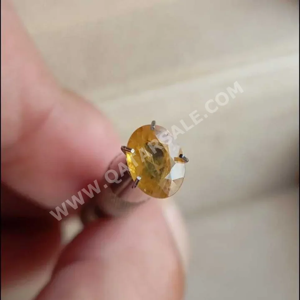 Gemstones Yellow Sapphire  245 Carat  Nature  Oval  SI1