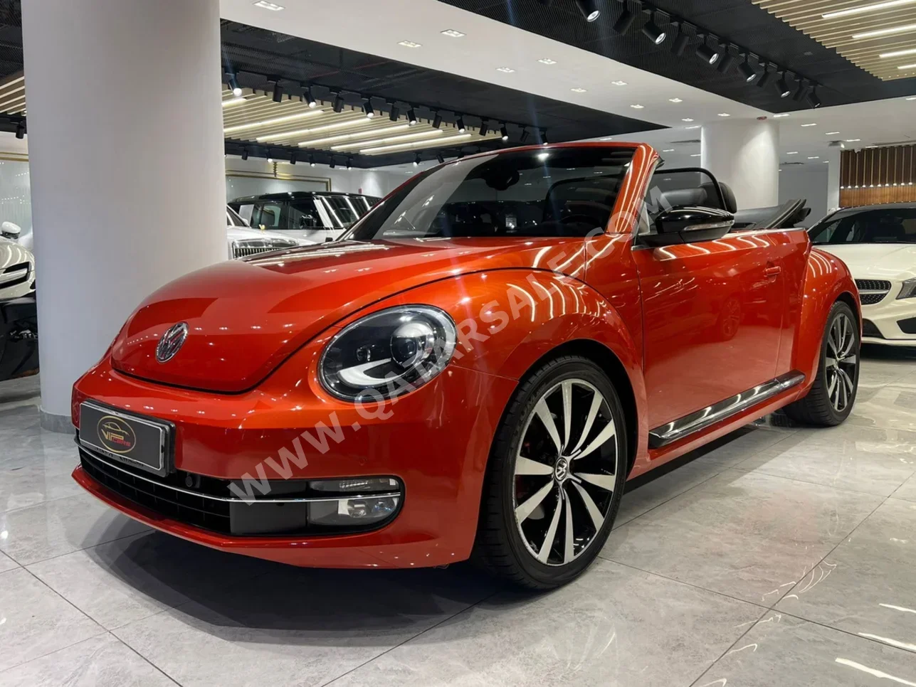 Volkswagen  Beetle  Turbo  2015  Automatic  133,000 Km  4 Cylinder  Front Wheel Drive (FWD)  Convertible  Orange