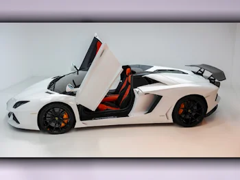 Lamborghini  Aventador  Roadster  2015  Automatic  21,000 Km  12 Cylinder  Rear Wheel Drive (RWD)  Convertible  White  With Warranty