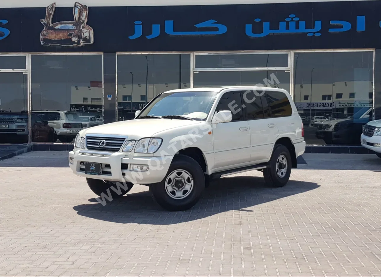 Lexus  LX  470  2001  Automatic  385,000 Km  8 Cylinder  Four Wheel Drive (4WD)  SUV  White