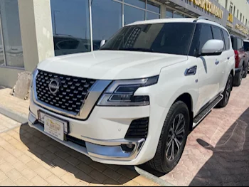 Nissan  Patrol  Titanium  2023  Automatic  31,000 Km  8 Cylinder  Four Wheel Drive (4WD)  SUV  White  With Warranty