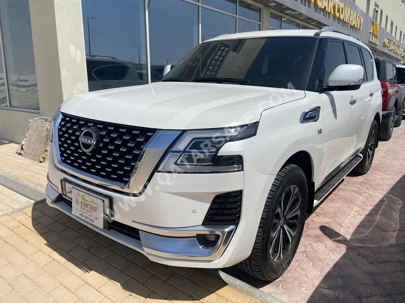 Nissan  Patrol  Titanium  2023  Automatic  31,000 Km  8 Cylinder  Four Wheel Drive (4WD)  SUV  White  With Warranty