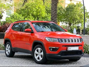 Jeep  Compass  longitude  2019  Automatic  63,000 Km  4 Cylinder  All Wheel Drive (AWD)  SUV  Orange