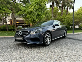 Mercedes-Benz  E-Class  300  2014  Automatic  62,000 Km  6 Cylinder  Rear Wheel Drive (RWD)  Sedan  Blue