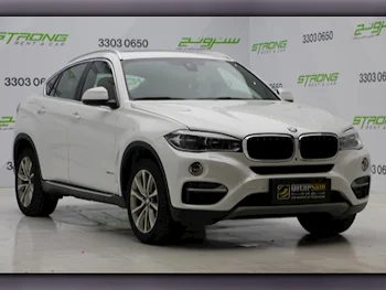 BMW  X-Series  X6  2016  Automatic  77,000 Km  6 Cylinder  Four Wheel Drive (4WD)  SUV  White