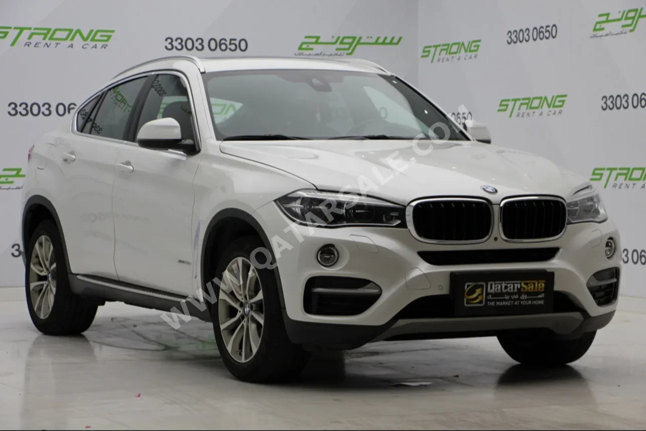 BMW  X-Series  X6  2016  Automatic  77,000 Km  6 Cylinder  Four Wheel Drive (4WD)  SUV  White