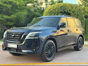 Nissan  Patrol  Platinum  2020  Automatic  100,000 Km  8 Cylinder  Four Wheel Drive (4WD)  SUV  Dark Blue  With Warranty