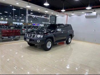 Nissan  Patrol  GL-V  2009  Manual  316,000 Km  6 Cylinder  Four Wheel Drive (4WD)  SUV  Black