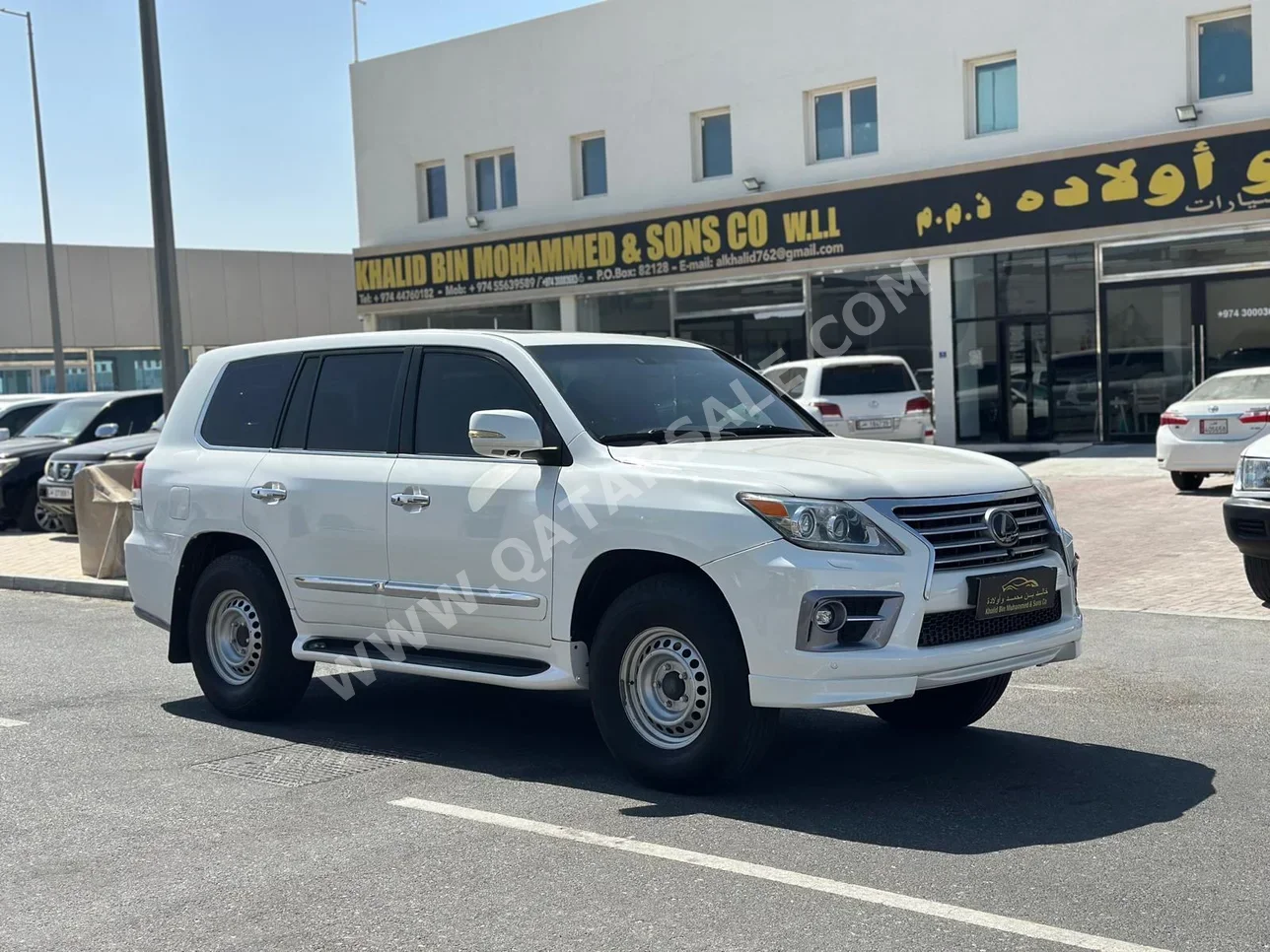 Lexus  LX  570 S  2011  Automatic  231,000 Km  8 Cylinder  Four Wheel Drive (4WD)  SUV  White