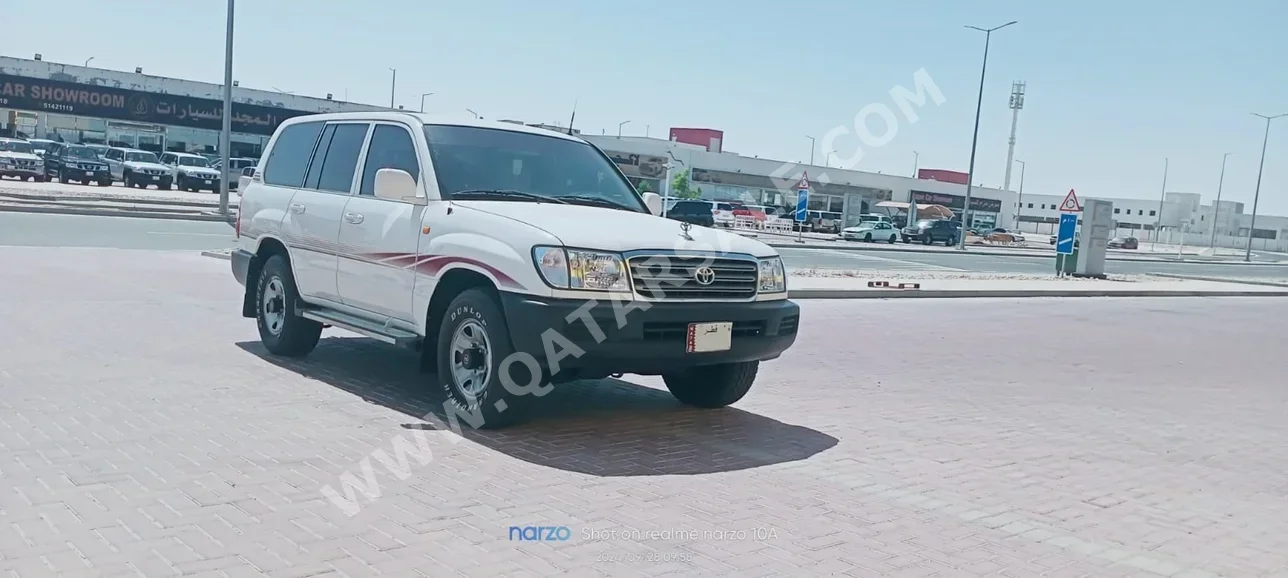 Toyota  Land Cruiser  GX  2003  Manual  75,000 Km  6 Cylinder  Four Wheel Drive (4WD)  SUV  White