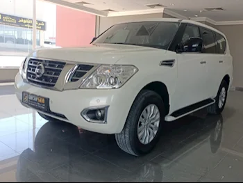 Nissan  Patrol  XE  2018  Automatic  59,000 Km  6 Cylinder  Four Wheel Drive (4WD)  SUV  White