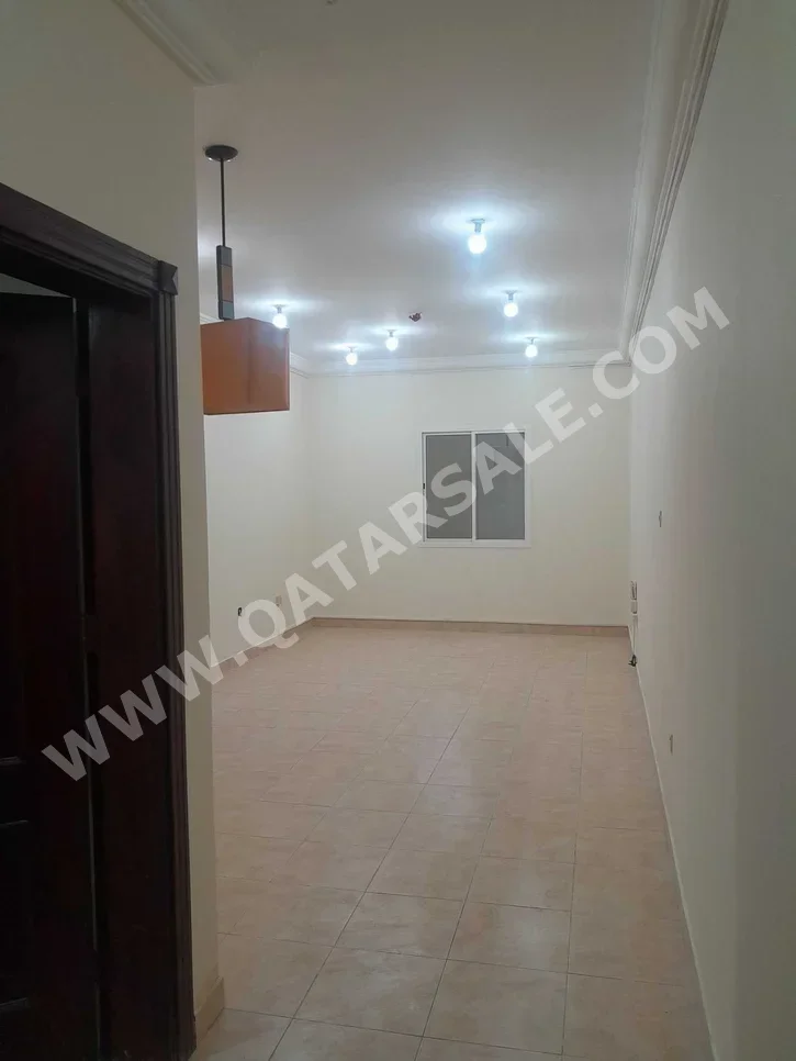 3 Bedrooms  Apartment  For Rent  in Doha -  Fereej Al Nasr  Not Furnished