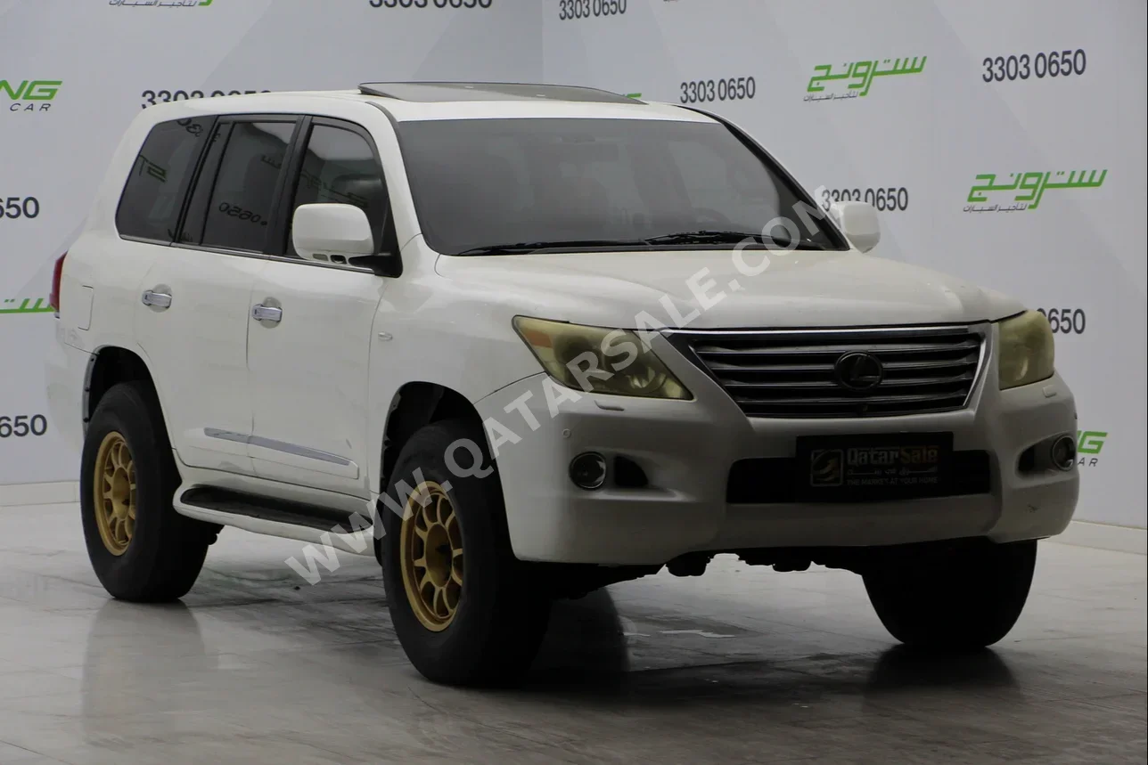  Lexus  LX  570  2009  Automatic  340,000 Km  8 Cylinder  Four Wheel Drive (4WD)  SUV  White  With Warranty