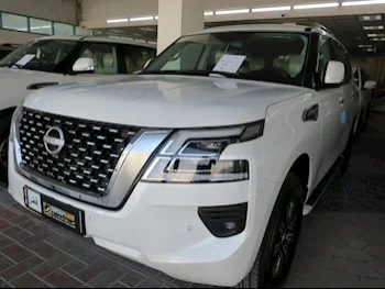 Nissan  Patrol  SE  2024  Automatic  0 Km  6 Cylinder  Four Wheel Drive (4WD)  SUV  White  With Warranty