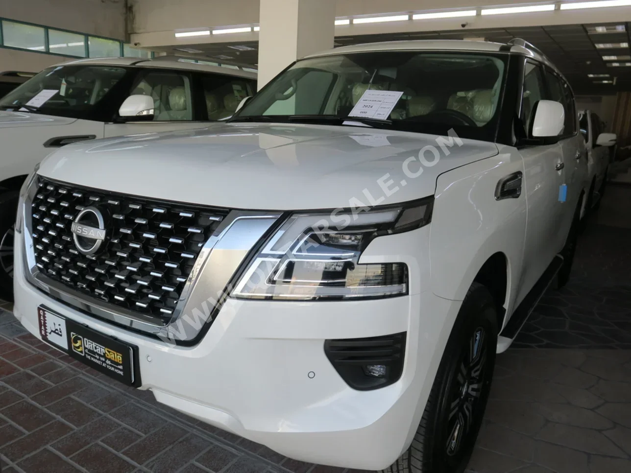 Nissan  Patrol  SE  2024  Automatic  0 Km  6 Cylinder  Four Wheel Drive (4WD)  SUV  White  With Warranty