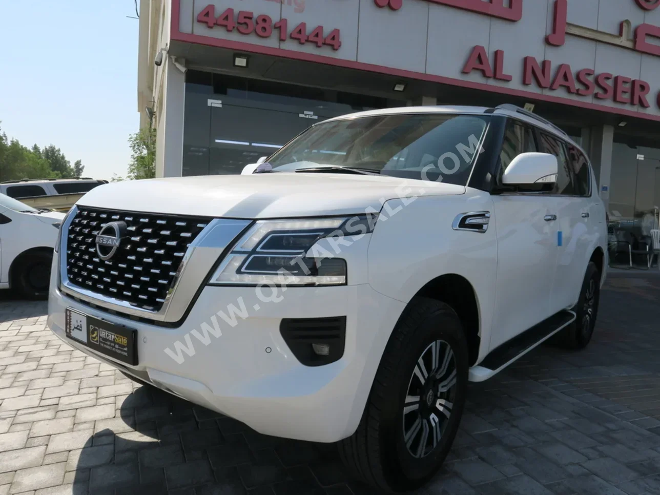  Nissan  Patrol  SE  2024  Automatic  0 Km  6 Cylinder  Four Wheel Drive (4WD)  SUV  White  With Warranty