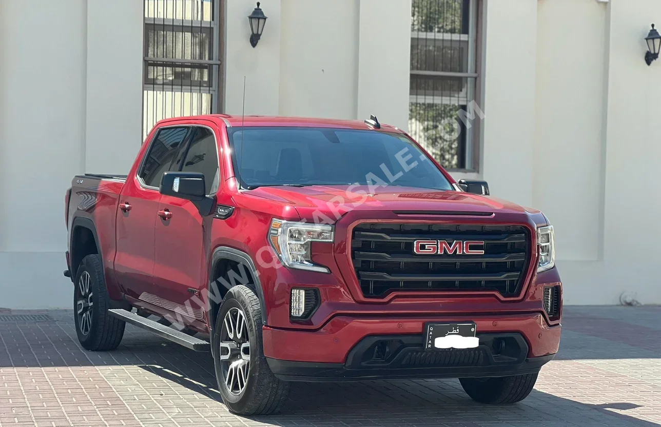 GMC  Sierra  Elevation  2019  Automatic  116,000 Km  8 Cylinder  Four Wheel Drive (4WD)  Pick Up  Red