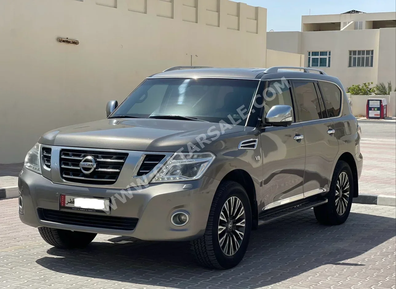 Nissan  Patrol  Platinum  2016  Automatic  189,000 Km  8 Cylinder  Four Wheel Drive (4WD)  SUV  Beige