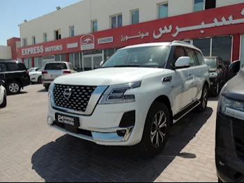 Nissan  Patrol  Titanium  2024  Automatic  0 Km  8 Cylinder  Four Wheel Drive (4WD)  SUV  White  With Warranty