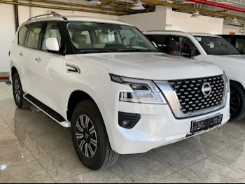 Nissan  Patrol  SE  2024  Automatic  0 Km  6 Cylinder  Four Wheel Drive (4WD)  SUV  White  With Warranty