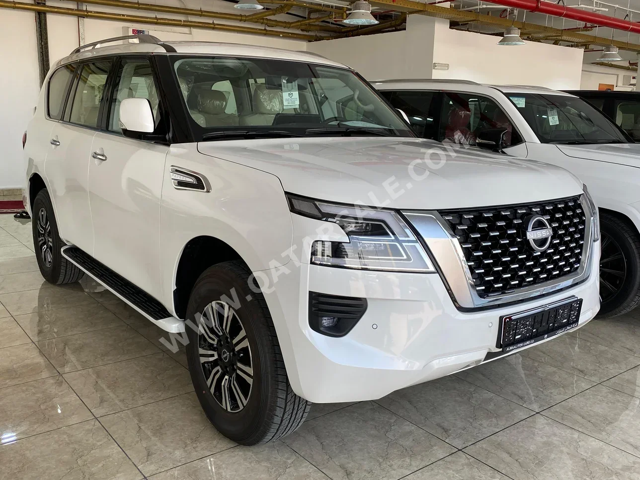 Nissan  Patrol  SE  2024  Automatic  0 Km  6 Cylinder  Four Wheel Drive (4WD)  SUV  White  With Warranty