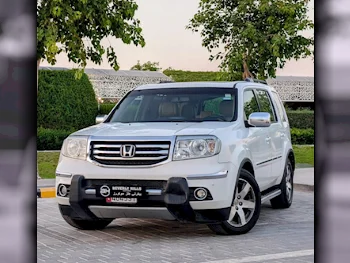 Honda  Pilot  Touring  2012  Automatic  154,000 Km  6 Cylinder  All Wheel Drive (AWD)  SUV  White