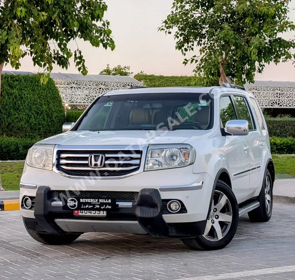 Honda  Pilot  Touring  2012  Automatic  154,000 Km  6 Cylinder  All Wheel Drive (AWD)  SUV  White