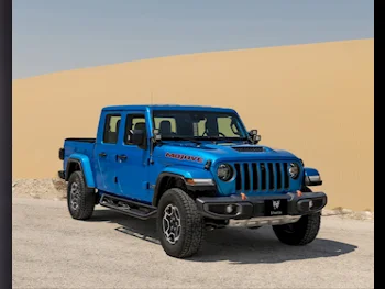 Jeep  Gladiator  Sand Runner  2021  Automatic  31,000 Km  6 Cylinder  Four Wheel Drive (4WD)  Pick Up  Blue  With Warranty