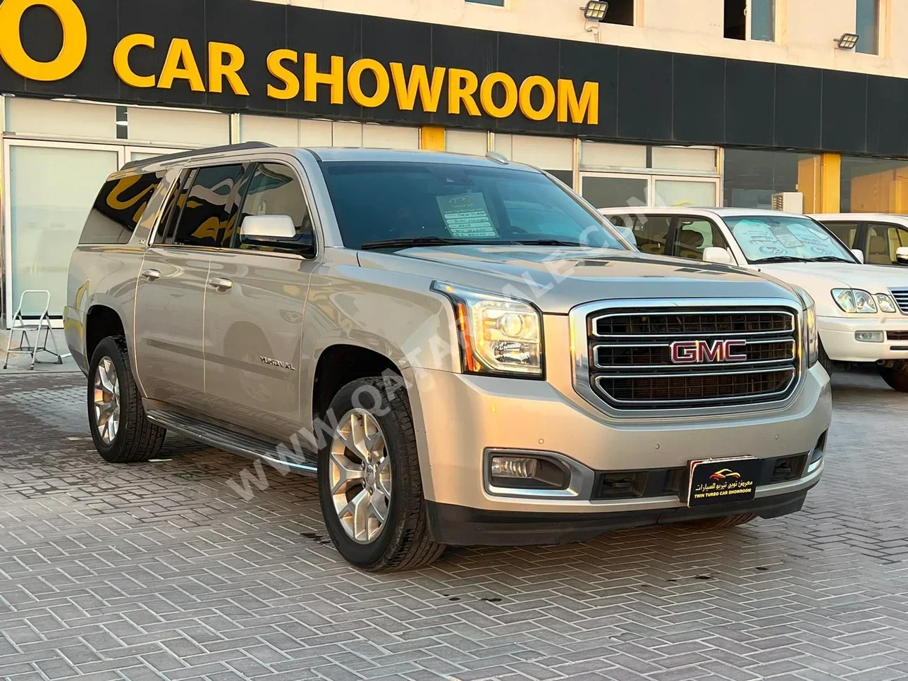 GMC  Yukon  XL  2015  Automatic  151,000 Km  8 Cylinder  Four Wheel Drive (4WD)  SUV  Gold