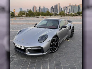 Porsche  911  Turbo S  2021  Automatic  19,000 Km  6 Cylinder  Rear Wheel Drive (RWD)  Coupe / Sport  Gray  With Warranty