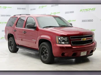 Chevrolet  Tahoe  LS  2013  Automatic  89,000 Km  8 Cylinder  Rear Wheel Drive (RWD)  SUV  Maroon