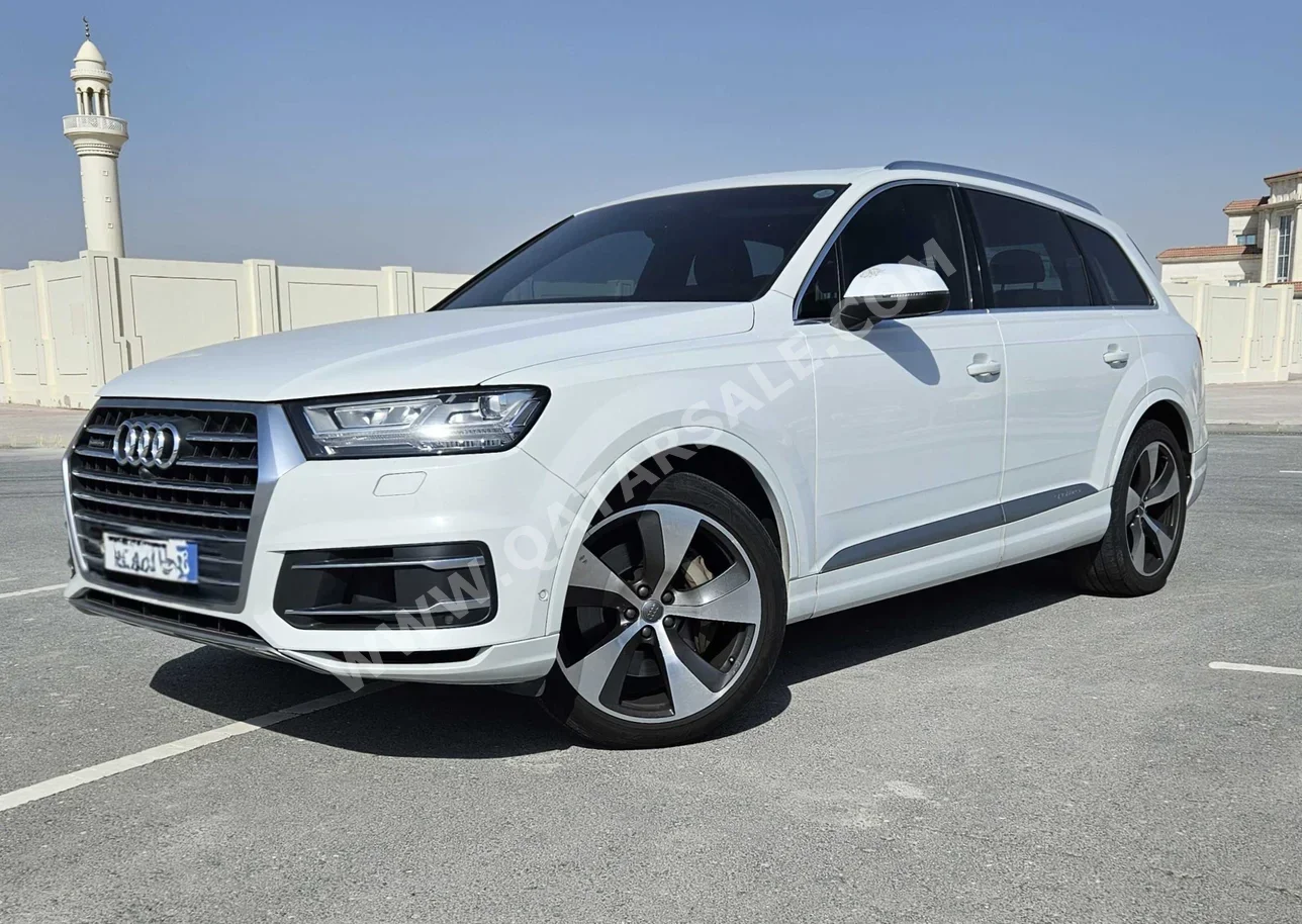 Audi  Q7  45 TFSI Quattro  2018  Automatic  149,000 Km  6 Cylinder  All Wheel Drive (AWD)  SUV  White  With Warranty