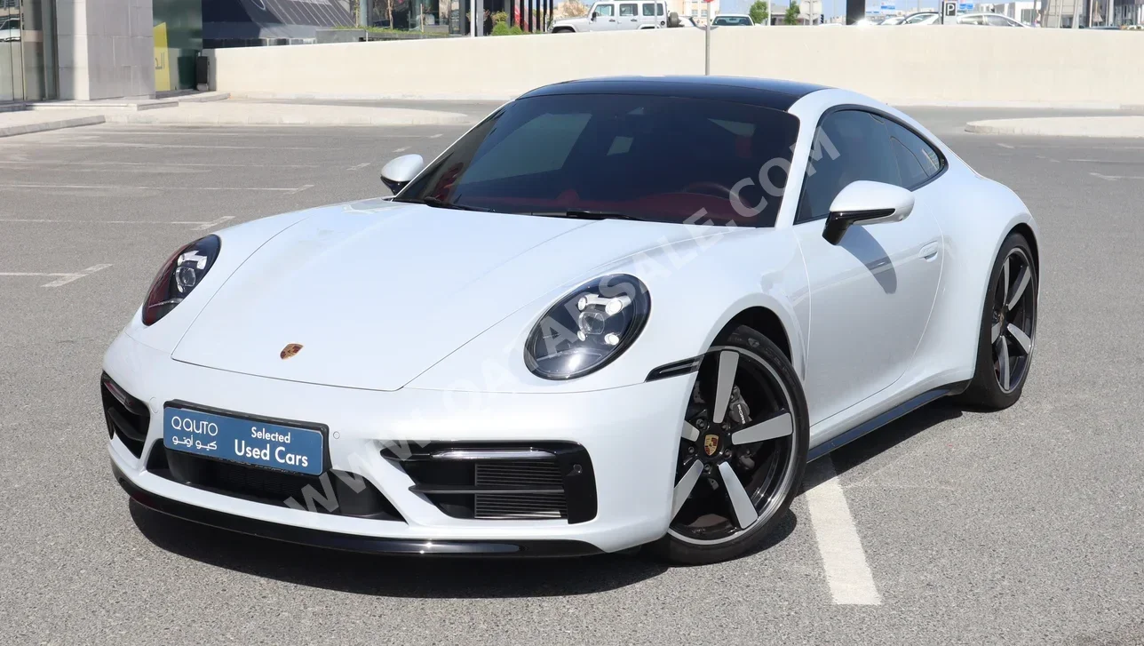 Porsche  911  Carrera  2024  Automatic  9,000 Km  6 Cylinder  Rear Wheel Drive (RWD)  Coupe / Sport  White  With Warranty