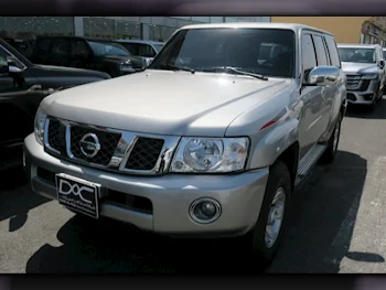 Nissan  Patrol  Safari  2023  Manual  65,000 Km  6 Cylinder  Four Wheel Drive (4WD)  SUV  Silver