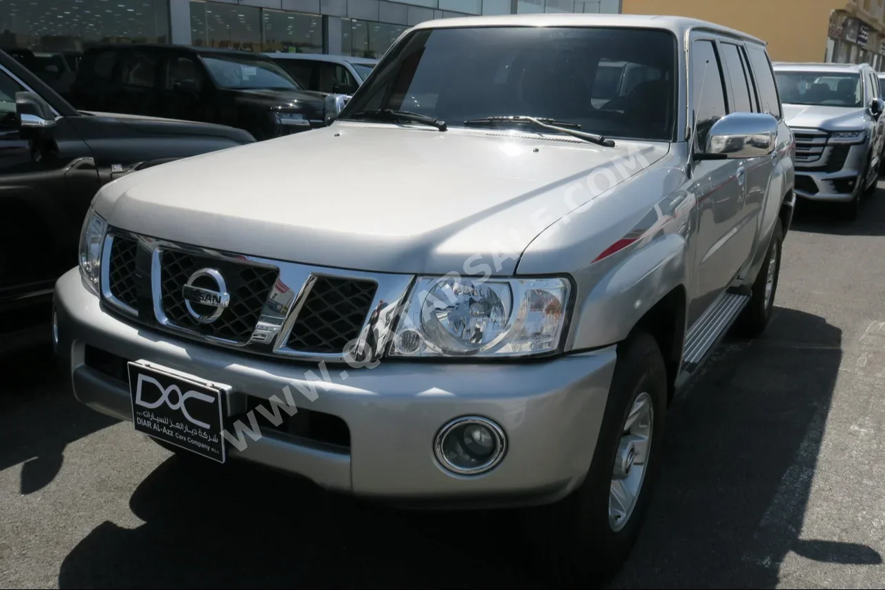 Nissan  Patrol  Safari  2023  Manual  65,000 Km  6 Cylinder  Four Wheel Drive (4WD)  SUV  Silver