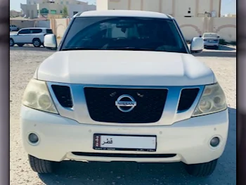 Nissan  Patrol  SE  2012  Automatic  186,000 Km  8 Cylinder  Four Wheel Drive (4WD)  SUV  White