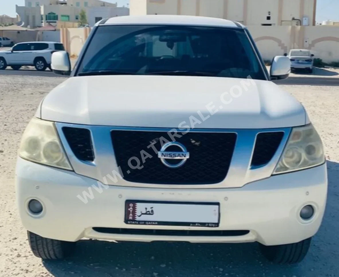 Nissan  Patrol  SE  2012  Automatic  186,000 Km  8 Cylinder  Four Wheel Drive (4WD)  SUV  White