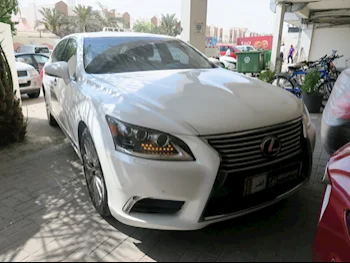 Lexus  LS  460 L  2014  Automatic  135,000 Km  8 Cylinder  Rear Wheel Drive (RWD)  Sedan  White