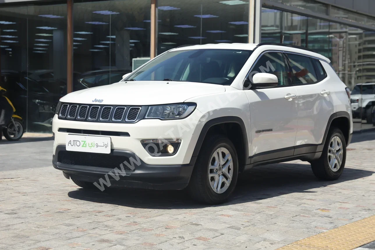 Jeep  Compass  longitude  2021  Automatic  49,700 Km  4 Cylinder  Four Wheel Drive (4WD)  SUV  White