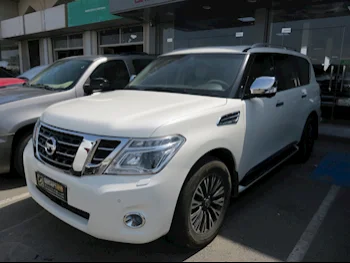 Nissan  Patrol  Platinum  2014  Automatic  200,000 Km  8 Cylinder  Four Wheel Drive (4WD)  SUV  White