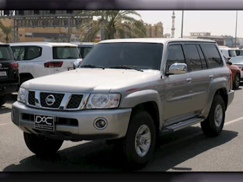 Nissan  Patrol  Safari  2023  Manual  65,000 Km  6 Cylinder  Four Wheel Drive (4WD)  SUV  Gray  With Warranty