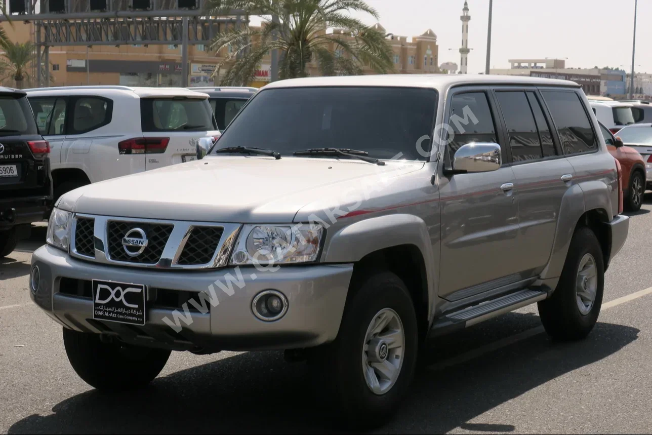 Nissan  Patrol  Safari  2023  Manual  65,000 Km  6 Cylinder  Four Wheel Drive (4WD)  SUV  Gray  With Warranty