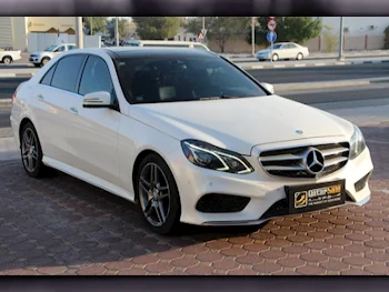 Mercedes-Benz  E-Class  400  2016  Automatic  126,000 Km  6 Cylinder  Rear Wheel Drive (RWD)  Sedan  Pearl