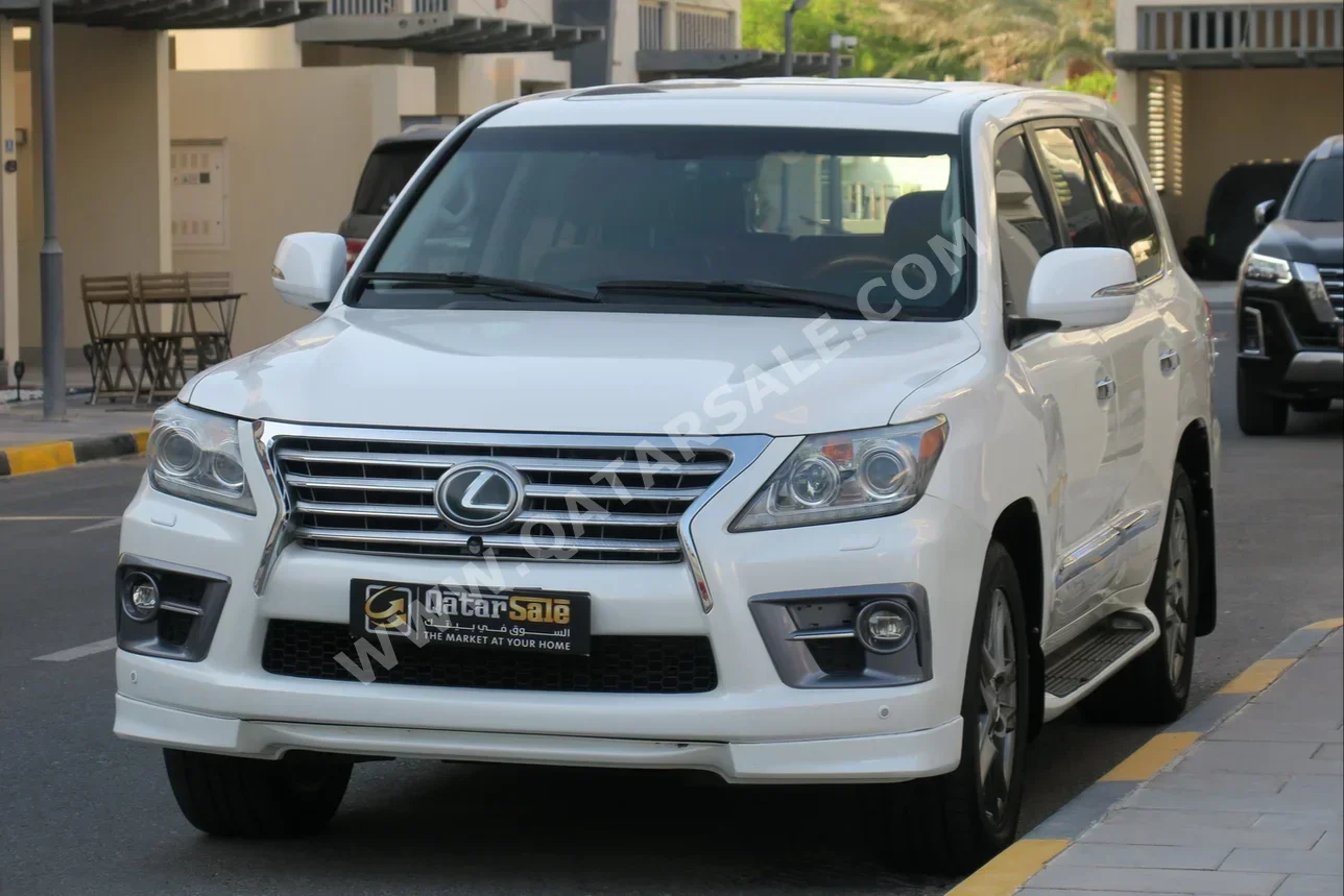 Lexus  LX  570 S  2013  Automatic  385,000 Km  8 Cylinder  Four Wheel Drive (4WD)  SUV  White