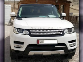 Land Rover  Range Rover  Sport  2014  Automatic  76,000 Km  6 Cylinder  Four Wheel Drive (4WD)  SUV  White